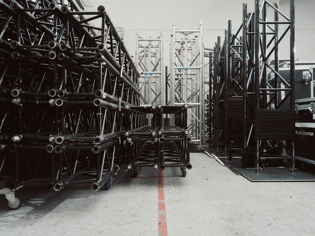 Event equipment stored on racks in the Multi warehouse